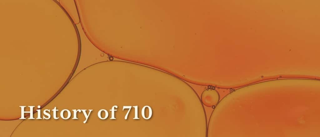 Orange color oil background. Text "History of 710"